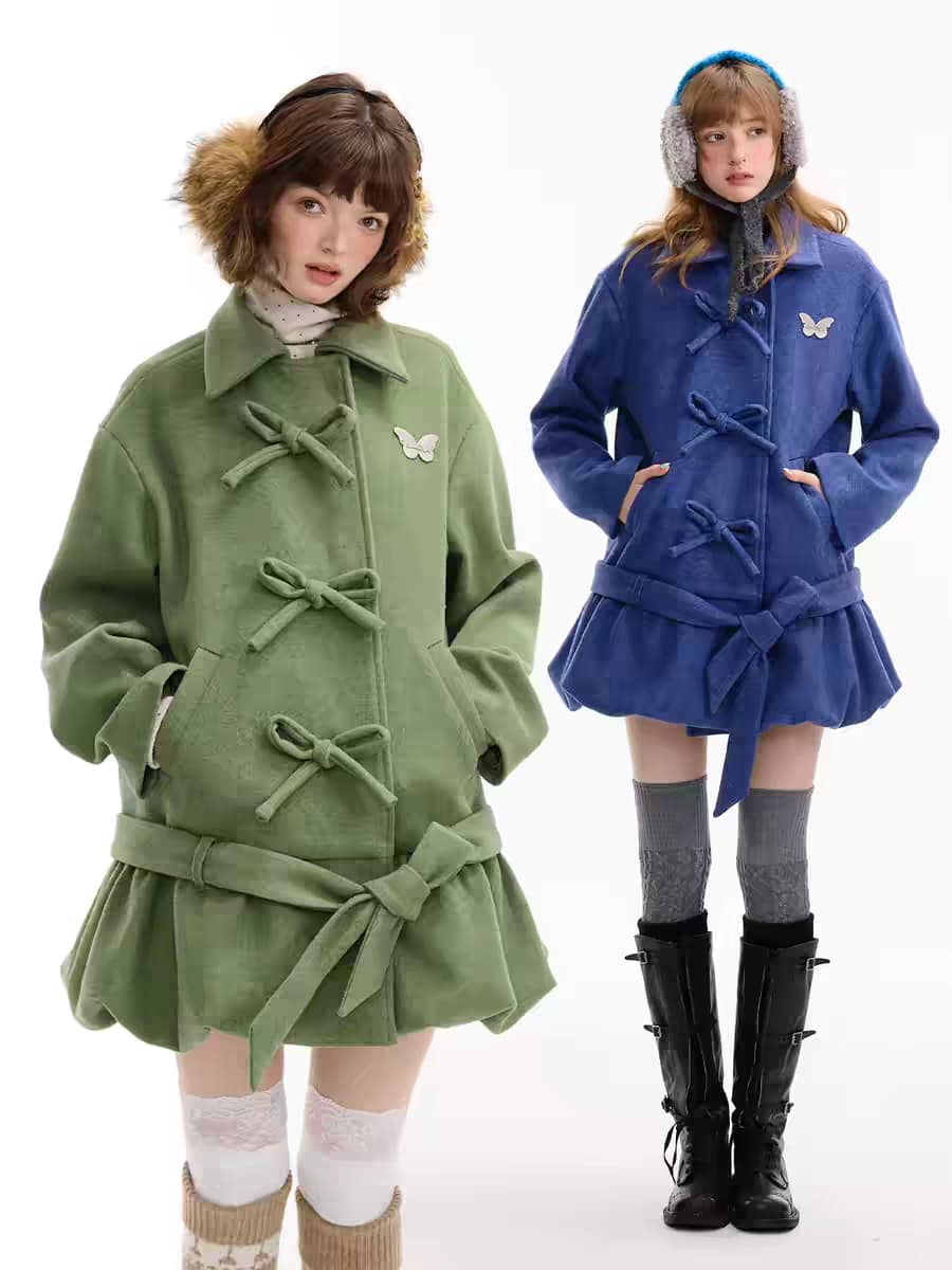 Пальто с бантом и асимметричным подолом