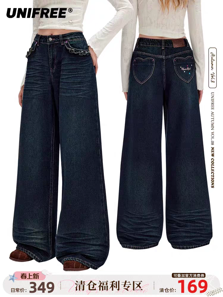 Синие джинсы с вышивкой и рюшами