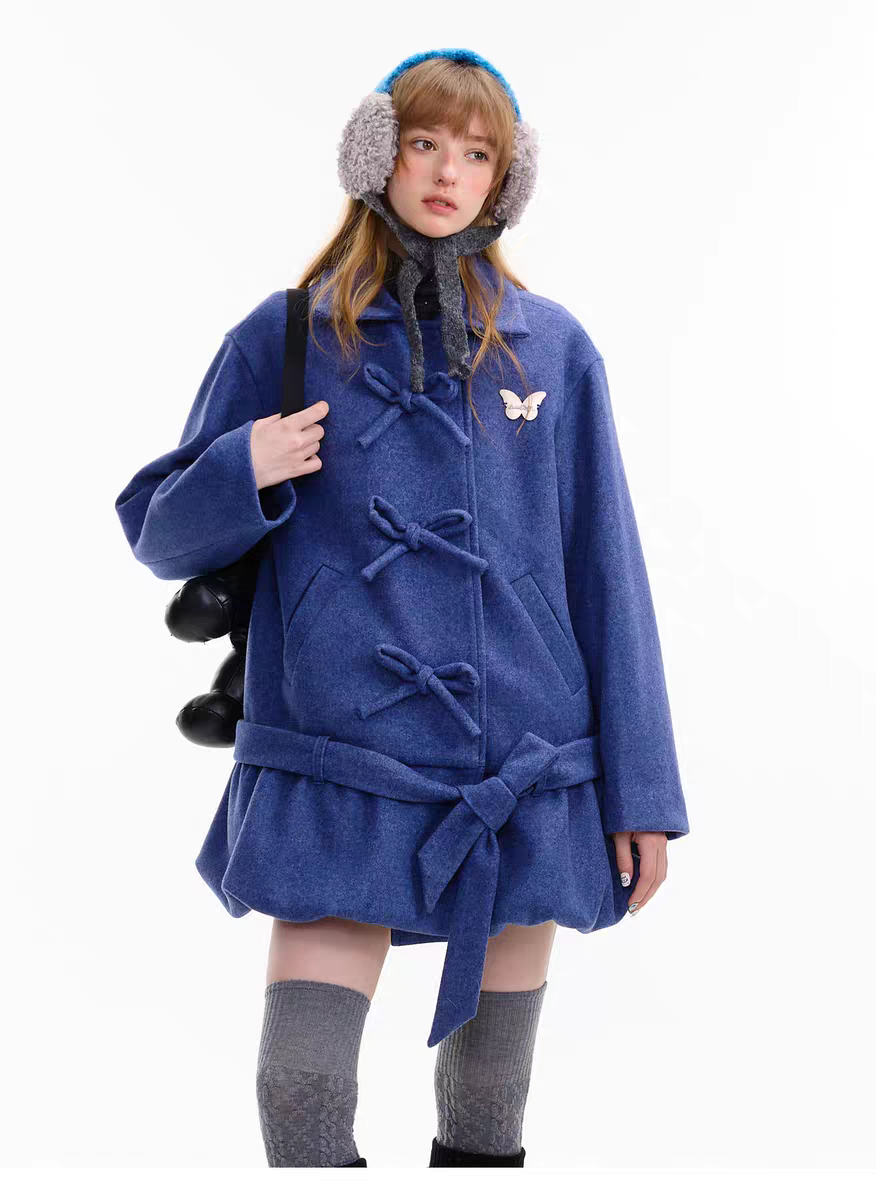 Пальто с бантом и асимметричным подолом детальное фото 15