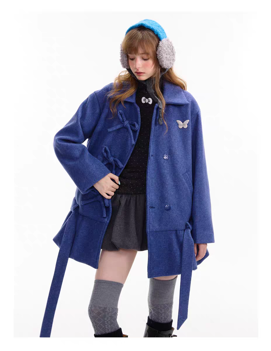 Пальто с бантом и асимметричным подолом детальное фото 18