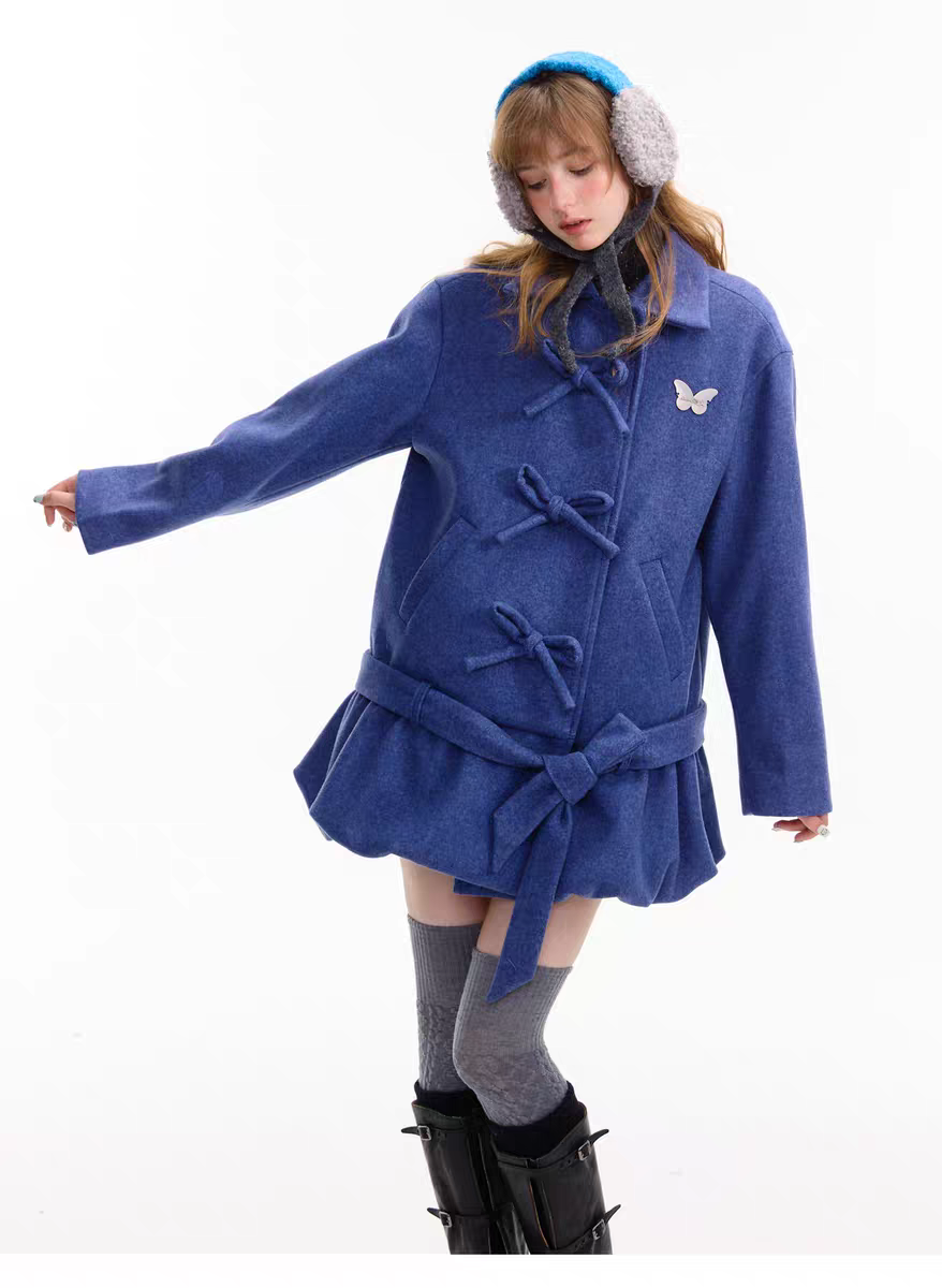 Пальто с бантом и асимметричным подолом детальное фото 20